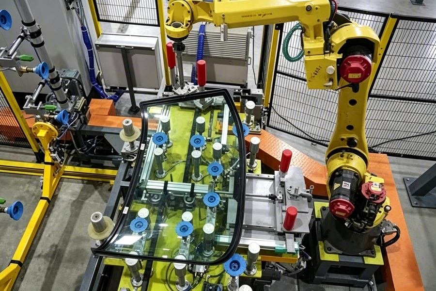 Specialty vehicle glass adhesive application